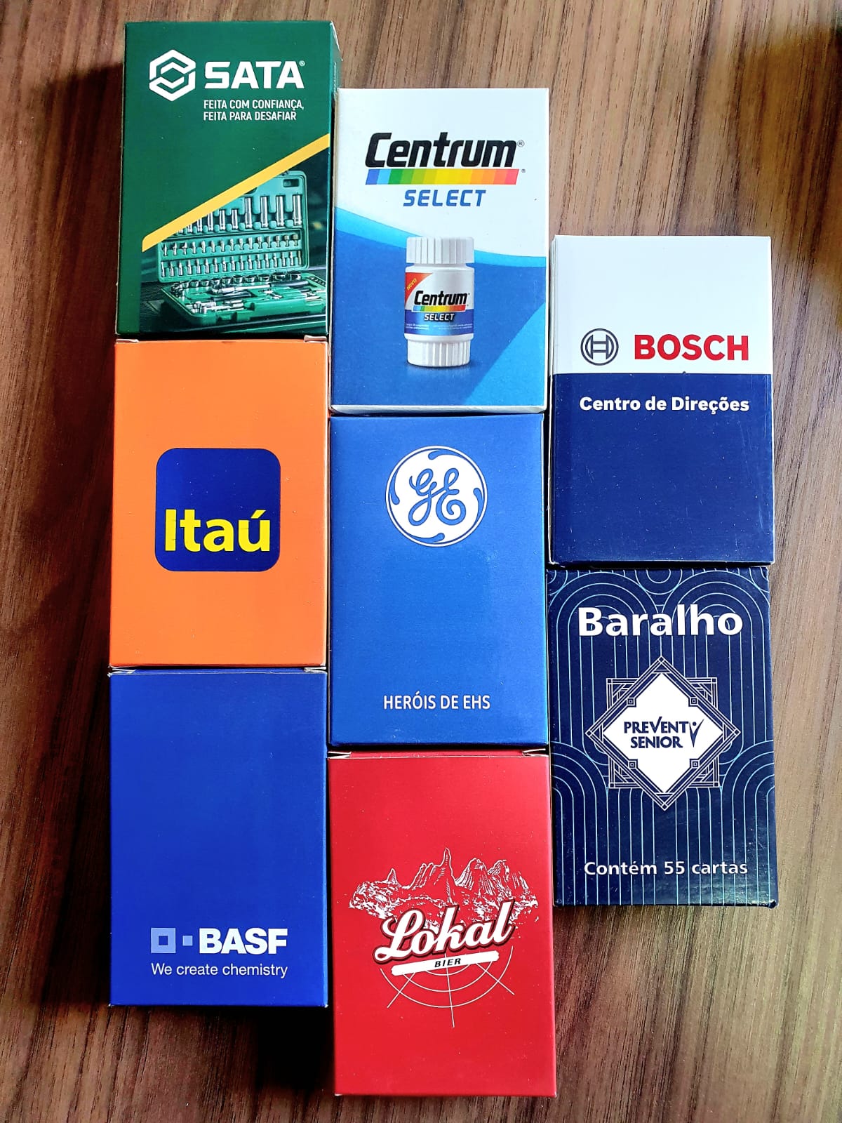 BASF · Bosch · GE · SATA — Linha de caixinhas produzido pela Upgraph